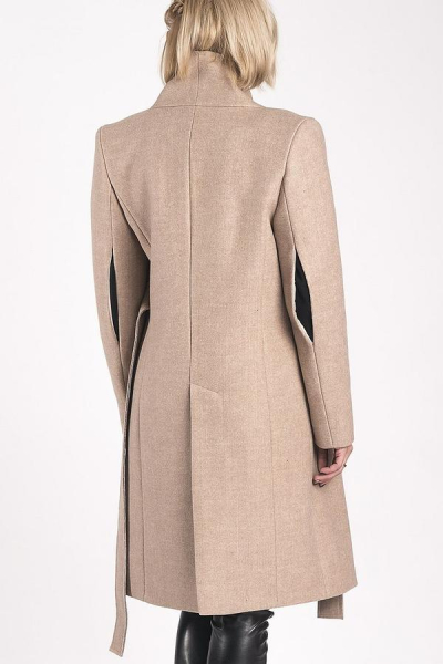 Шлиця на пальто Фото: pinterest.com Шлица на пальто Фото:pinterest.com